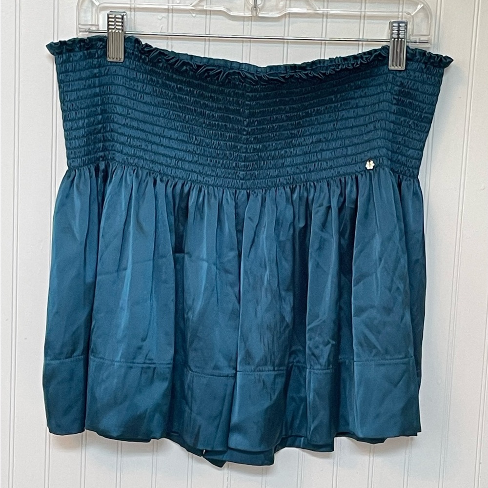 Teal silky shorts.